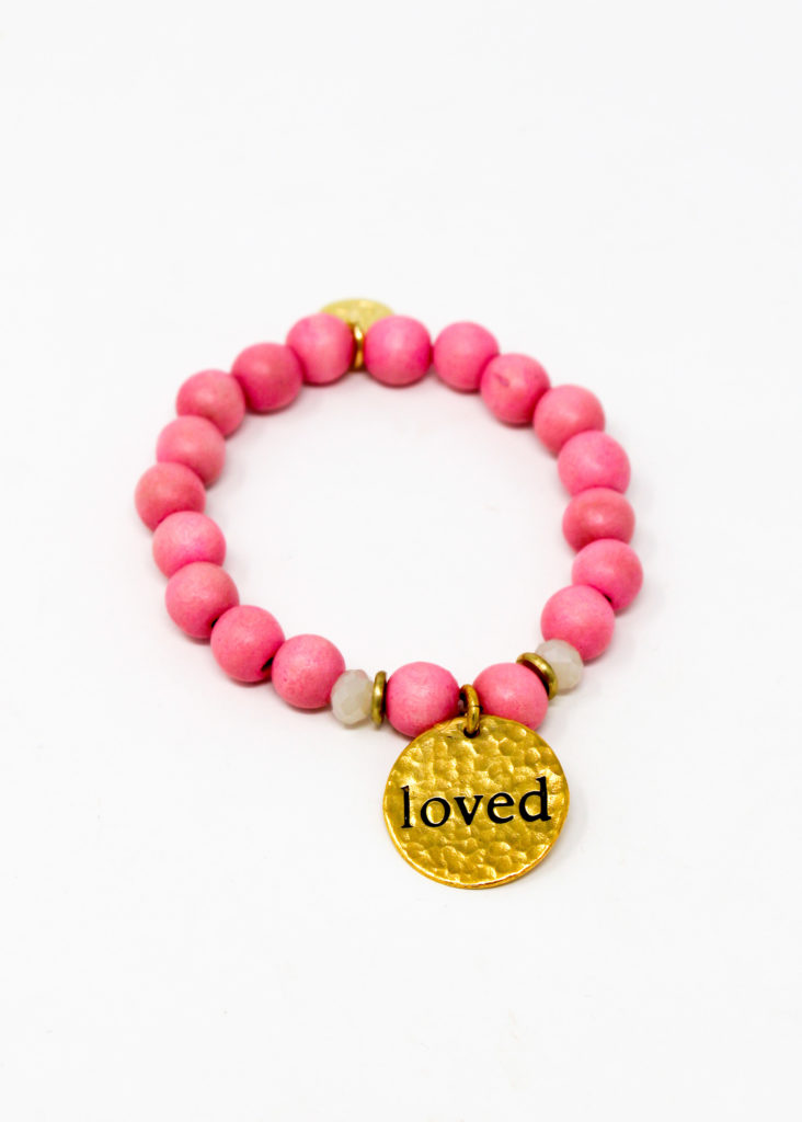 Designed by Fashion & Compassion, the reminder for your girl that she is deeply and unconditionally loved!
